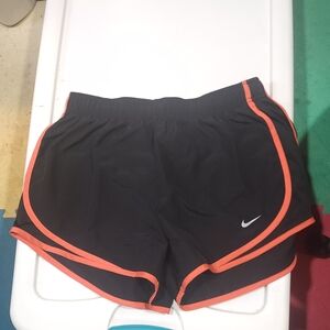 Nike Women's Black Shorts with Orange Trim